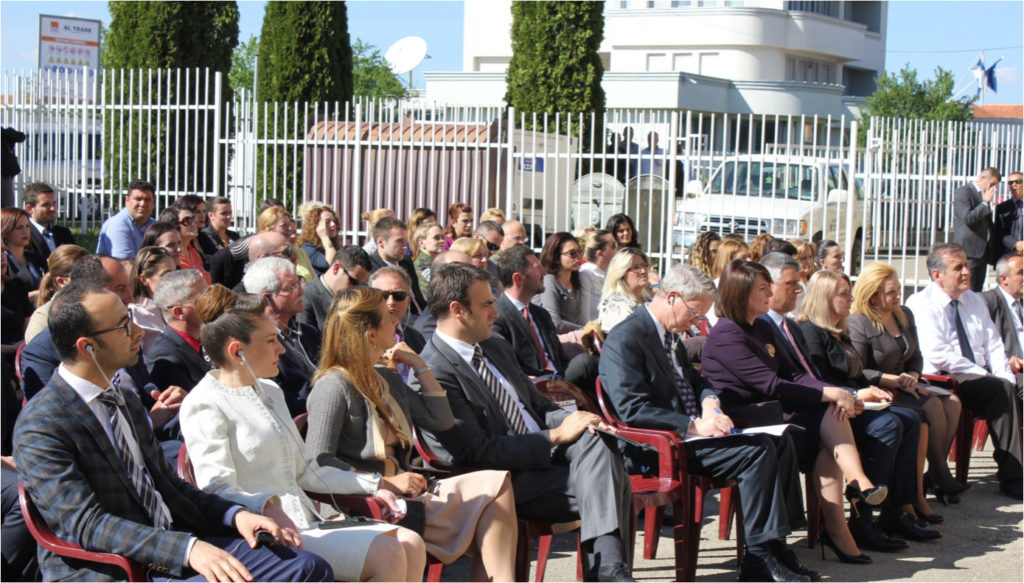 The US Ambassador (at center, making notes), the incoming and outgoing Presidents of Kosovo, and the UK and Turkish Ambassadors all attended the ribbon-cutting ceremony (photo courtesy US Army)
